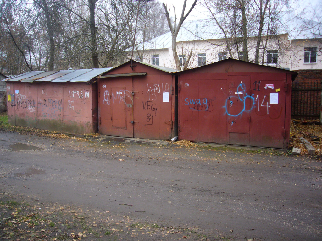 Гаражи в октябрьском. Снесли гаражи Октябрьская 105. Номер на гараж.